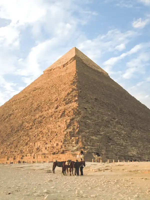 Great Pyramids of Giza rising from the Egyptian desert at golden hour