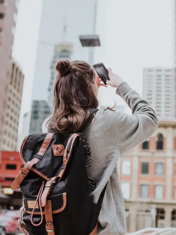 Traveller at scenic sunset viewpoint — tour packages